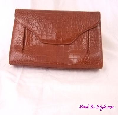 bally-tan-embossed-leather-clutch-1
